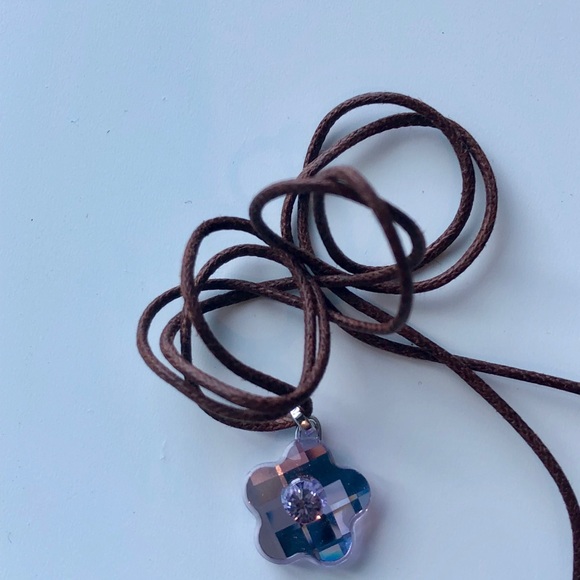 Swarovski Jewelry - 💜SWAROVSKI FLOWER NECKLACE ON BROWN WAXED CORD
